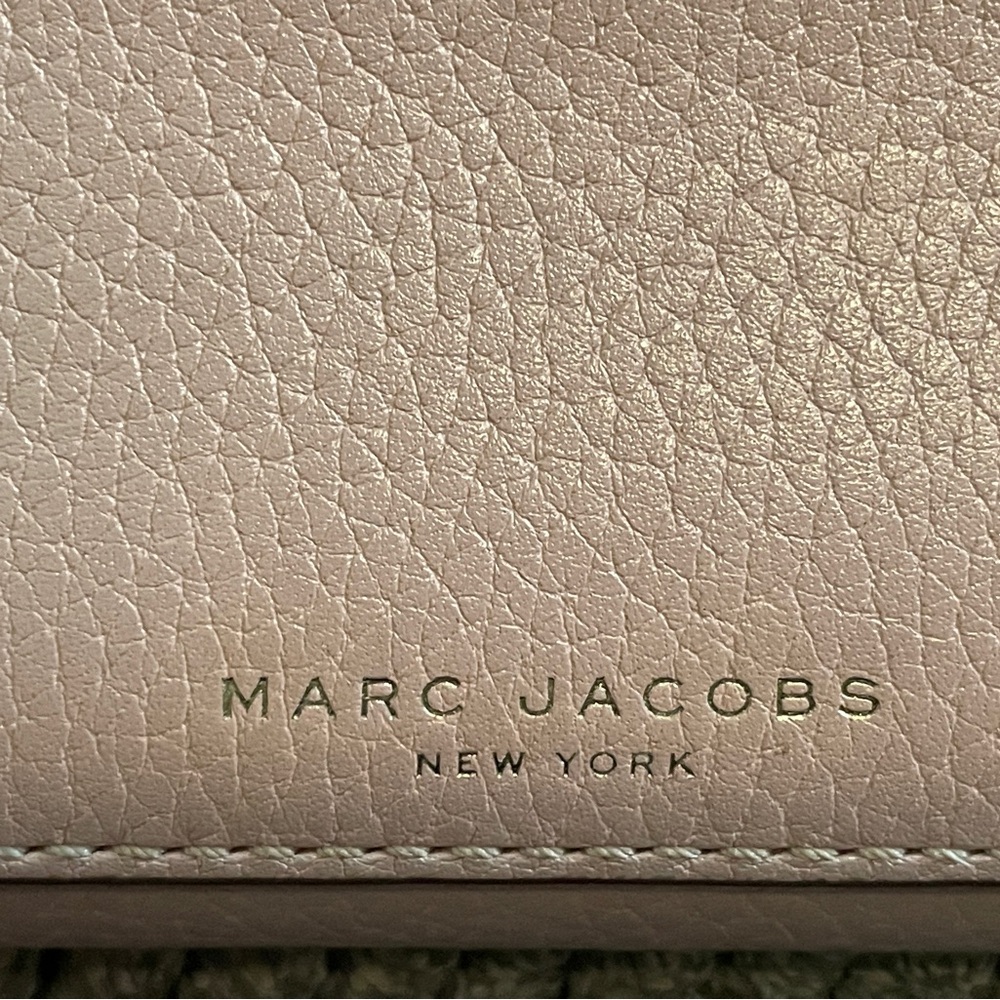 Marc Jacob’s compact wallet pinkish purple color